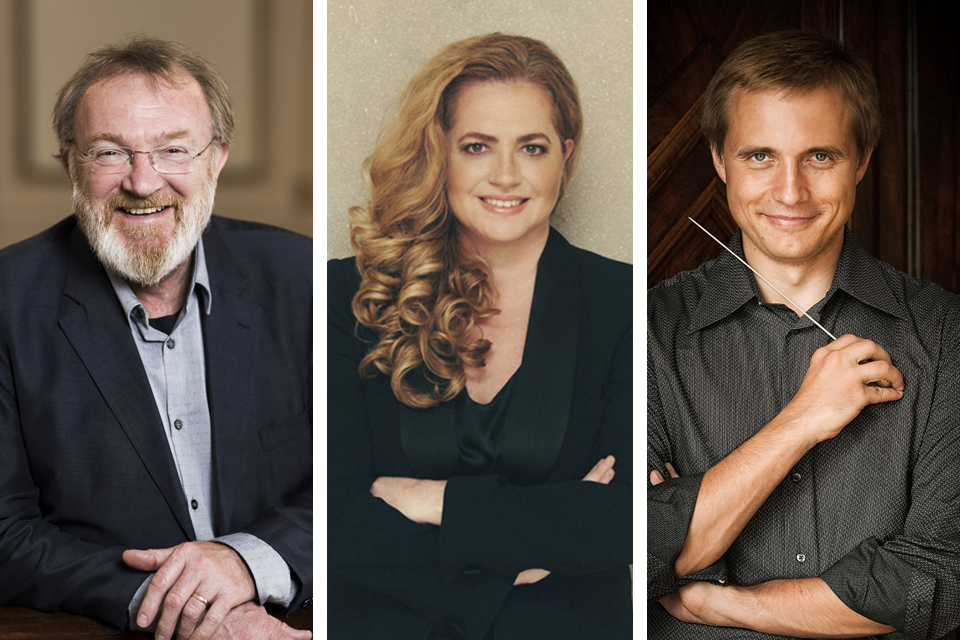 A man with a beard wearing glasses, a woman with long hair and folded arms smiling, and a man holding a conducting baton